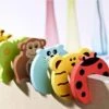 Deurstoppers Schuim Voor Kinderen - Veiligheids Deurstopper Kind / Baby - Klem Bescherming - Vinger Bescherming - Multicolour Dieren - 4 Stuks